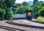 A local rounds the bend at Bridgeport 